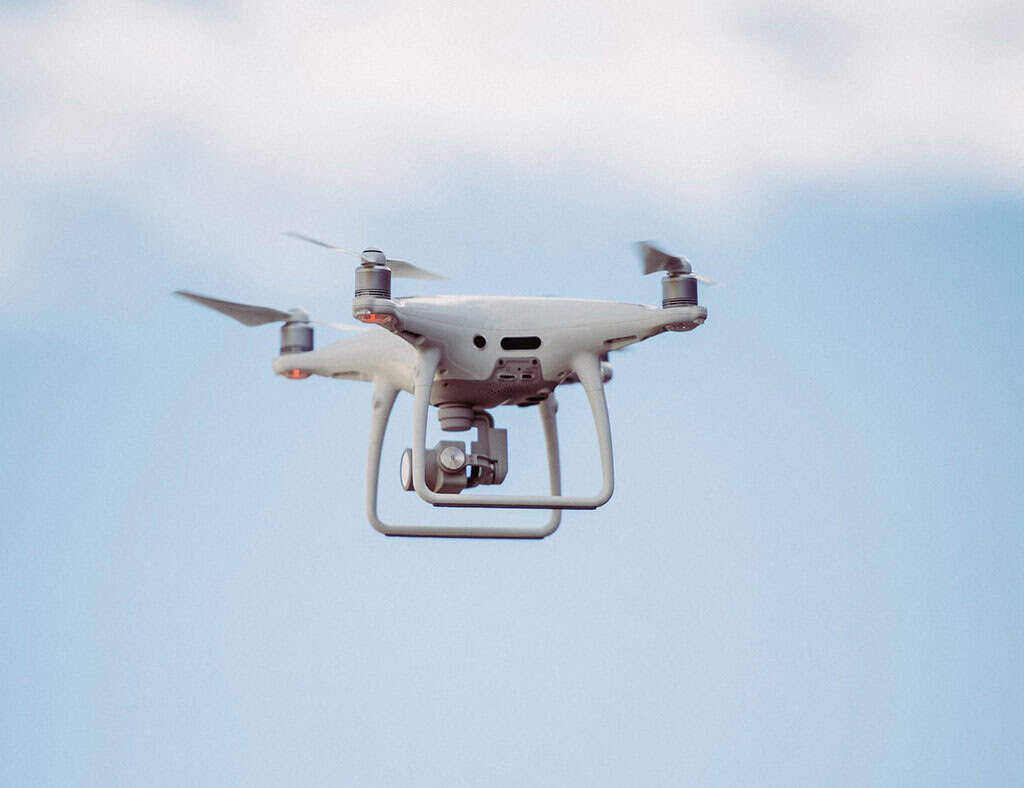 White drone in mid air